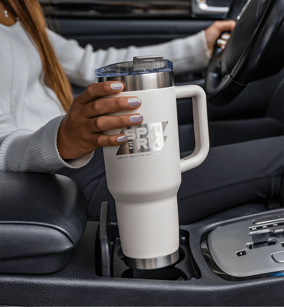 Stylish mug in woman's hand